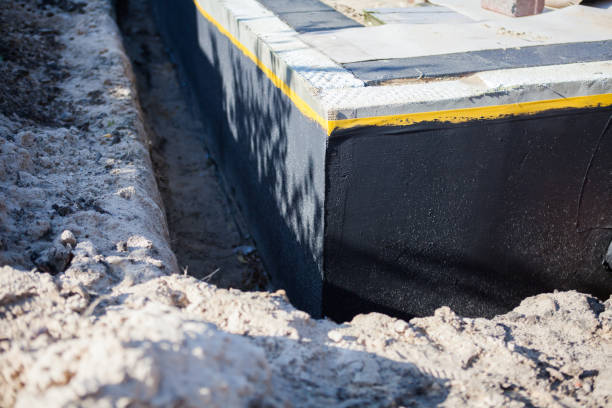 Professional Exterior Waterproofing technician working in Monroeville, IN